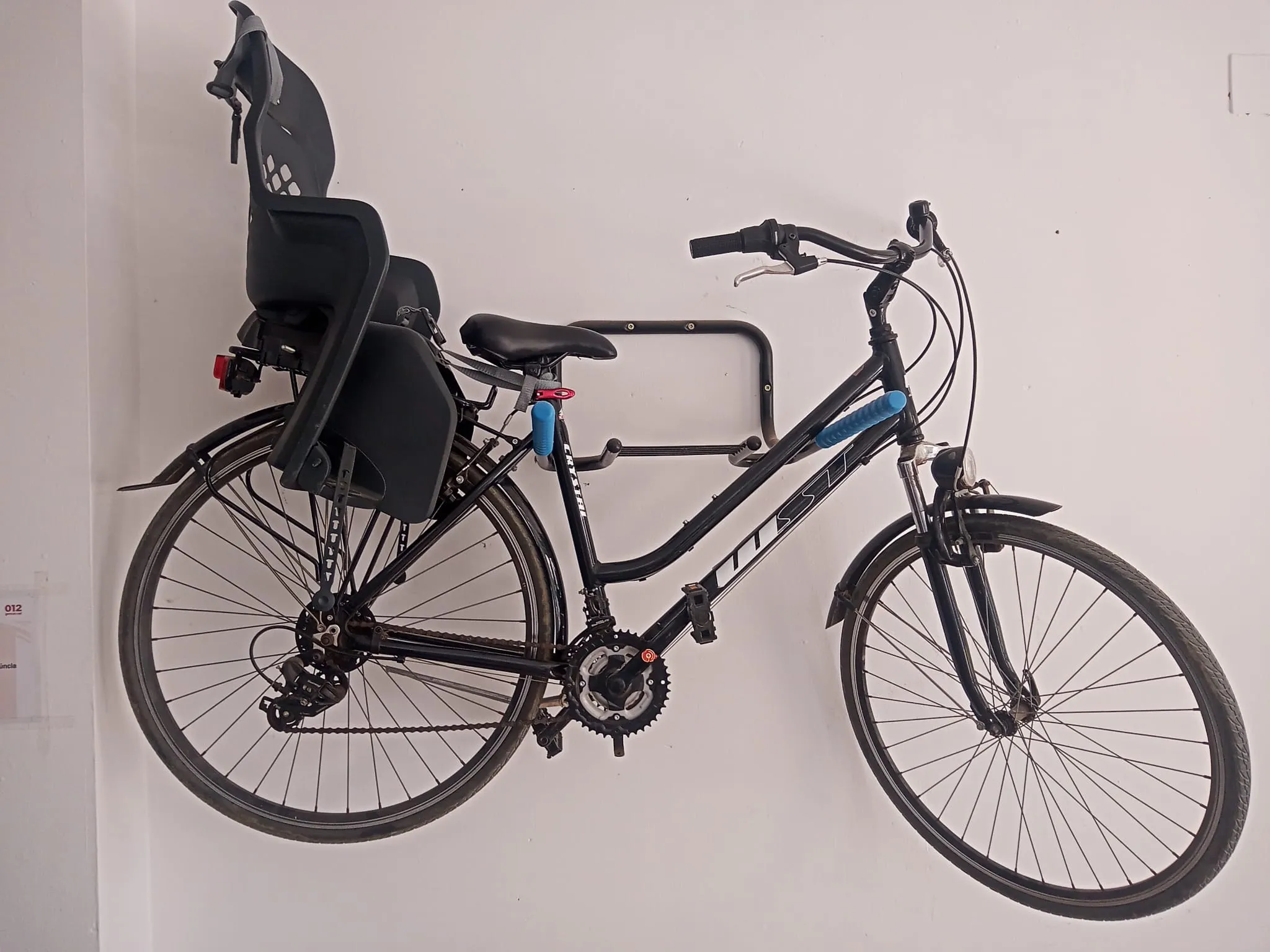 Bicicleta con silla infantil para familias en Malgrat de Mar
